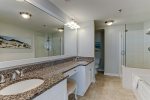 Primary en suite bath has large walk-in shower, 6ft bathtub, dual sinks and vanity area. 